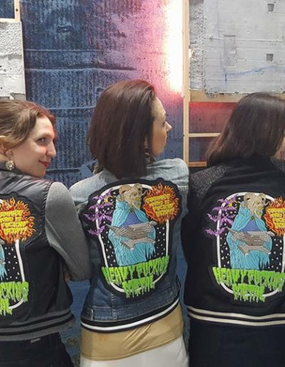 Photo taken by Jason Patrick Voegele of our artist ‘girl gang’ in Miriam Carother’s Heavy Metal jackets at the Lodge Gallery booth.